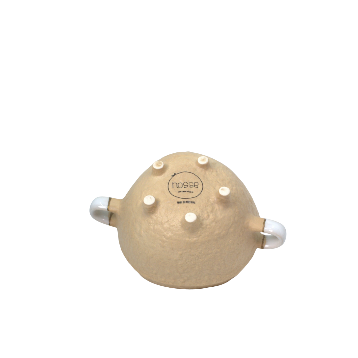 Bottom of Nosse Ubuntu Bowl showing logo and beige textured surface