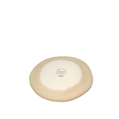 Bottom of Nosse Ubuntu Dessert Plate with Nosse logo and textured clay surface